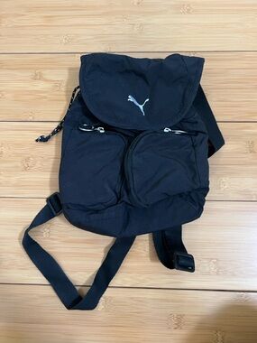 Puma Black Mini Flap Backpack with Silver Logo